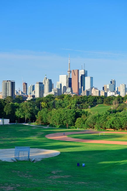 toronto-skyline-park-with-urban-buildings-blue-sky